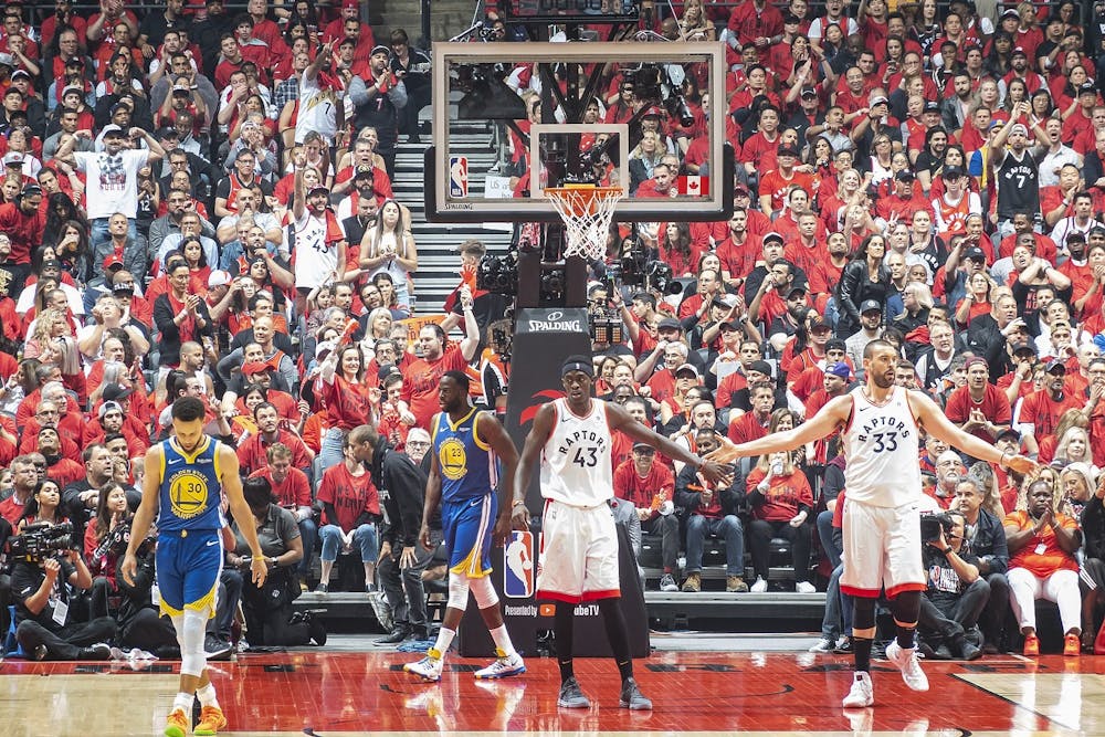 <p>Toronto Raptors forward Pascal Siakam engages with Toronto Raptors center Marc Gasol during a dead ball in Game 2 of the 2019 NBA Finals June 2, 2019. Golden State Warriors guard Stephen Curry scored 23 points, while forward Draymond Green scored 17 points in the 109-104 win. <strong> </strong><em><strong>Chensiyuan, Photo Courtesy </strong></em></p>