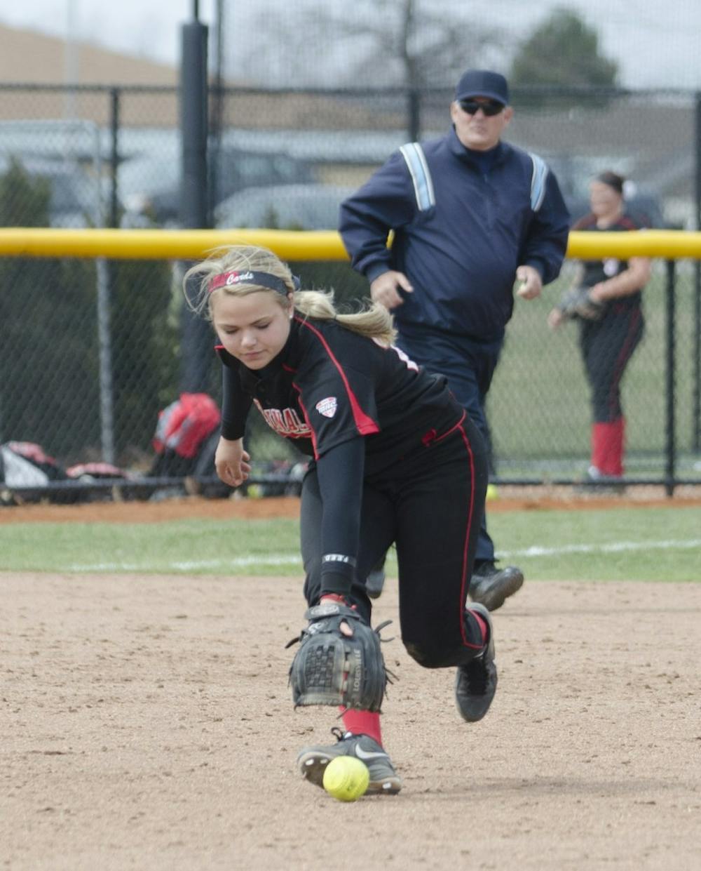 Freshman Amanda Arnett reaches for the ball in the game against Toledo on April 6 at the Ball State Softball Complex. DN PHOTO BREANNA DAUGHERTY