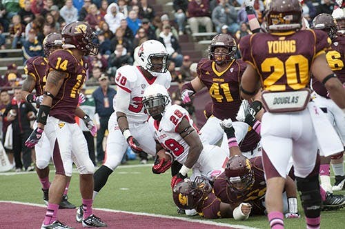 Running back Barrington Scott attempts a touchdown Oct. 20, 2012 against Central Michigan. DN FILE PHOTO BOBBY ELLIS