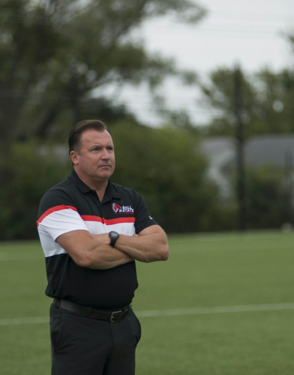 Head coach Craig Roberts looks onward as the women's soccer team plays Northern Illinois on Oct. 8 at the Briner Sports Complex. Roberts is on his eighth season as head coach. Breanna Daugherty, DN
