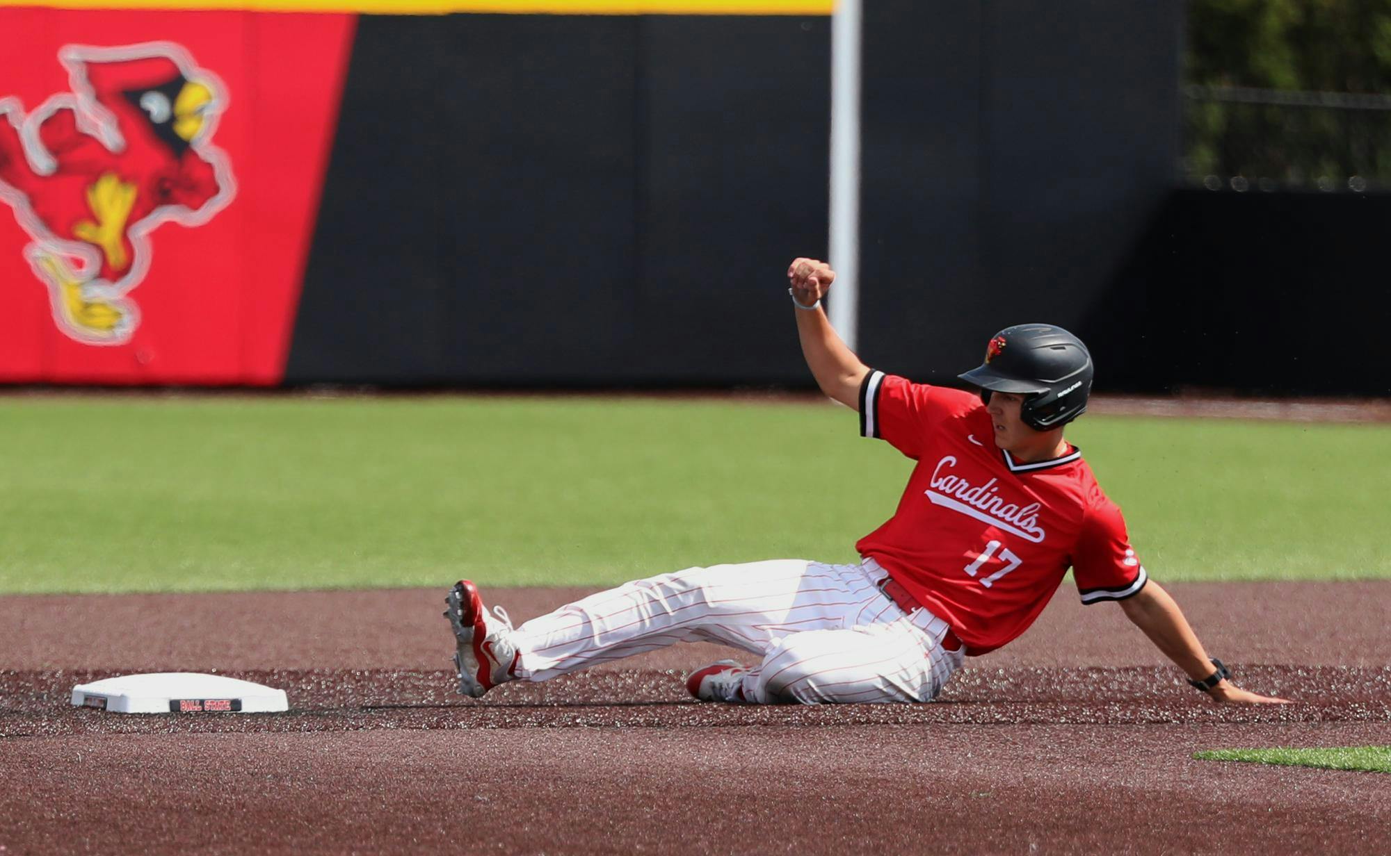 Freshman infielder Conner Hutchinson slides into third base against Ohio March 30 at First Merchants Ballpark Complex. Hutchinson had one run in the game. Mya Cataline, DN