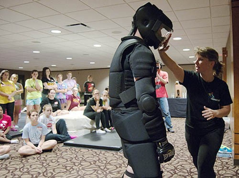 Mellisa Holtzman demonstrates part of the physical protection in Elemental. The program is designed to provide physical, verbal and situational tools to prevent sexual assault. DN FILE PHOTO BOBBY ELLIS