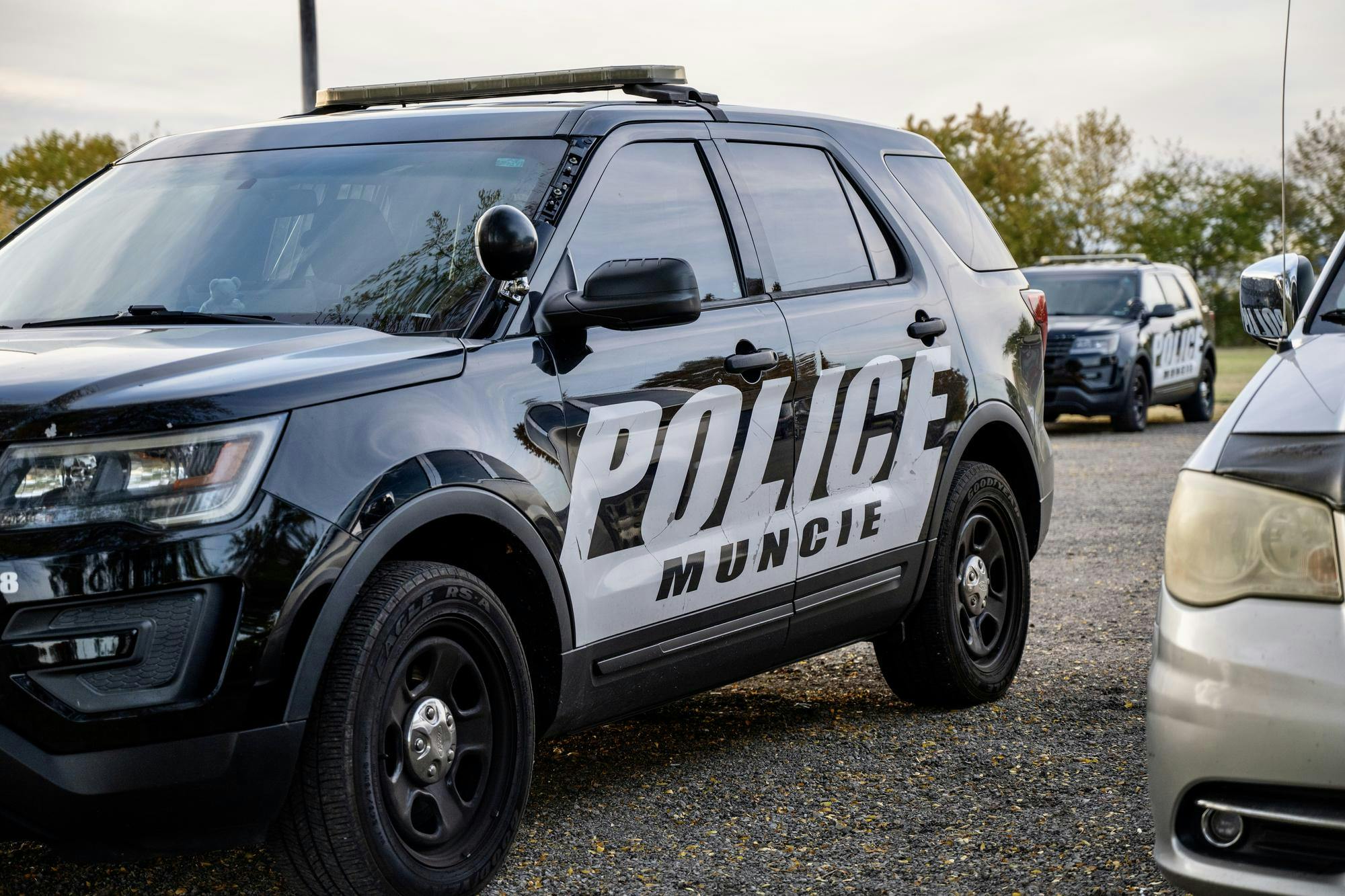 A Muncie Police car parked in a parking lot. 