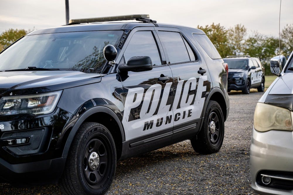 A Muncie Police car parked in a parking lot. 