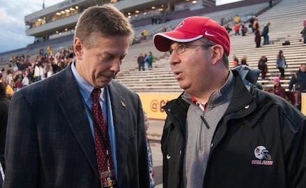 DN FILE PHOTO BOBBY ELLIS Coach Pete Lembo speaks to Athletic Director Bill Scholl after the victory over Central Michigan. The Cardinals have a bye week, giving them extra time to prepare for the game against Toledo.