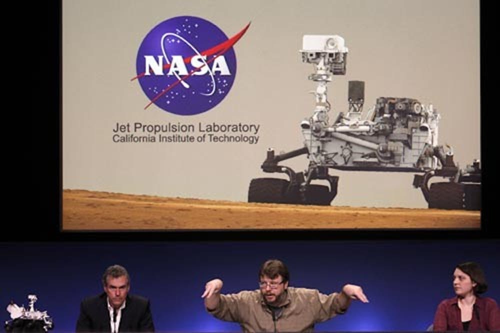 From left, Mike Watkins, Ken Edgett and Sarah Milkovich discuss new images showing the surface of Mars during a news conference for NASA’s Mars Science Laboratory Curiosity rover at Jet Propulsion Laboratory in Pasadena, Calif., on Aug. 7, 2012. MCT PHOTO