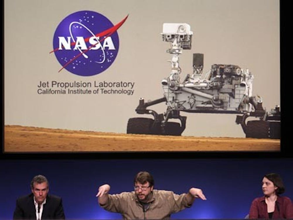 From left, Mike Watkins, Ken Edgett and Sarah Milkovich discuss new images showing the surface of Mars during a news conference for NASA’s Mars Science Laboratory Curiosity rover at Jet Propulsion Laboratory in Pasadena, Calif., on Aug. 7, 2012. MCT PHOTO