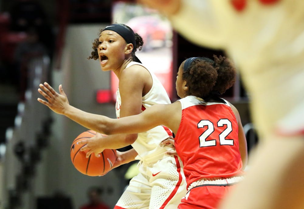 <p>Ball State junior forward Oshlynn Brown calls a play while being guarded by Western Kentucky junior guard Sherry Porter during the Cardinals' game against the Hilltoppers Dec. 7, 2019, at John E. Worthen Arena. Brown was Ball State's leading scorer with 22 points. <strong>Paige Grider, DN&nbsp;</strong></p>