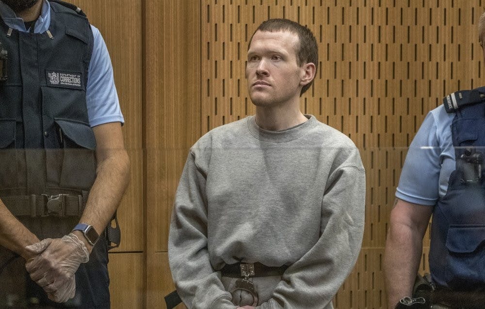<p>Twenty-nine-year-old Australian Brenton Harrison Tarrant stands in the dock at the Christchurch High Court for sentencing after pleading guilty to 51 counts of murder, 40 counts of attempted murder and one count of terrorism in Christchurch, New Zealand, Monday, Aug. 24, 2020. More than 60 survivors and family members will confront the New Zealand mosque gunman this week when he appears in court to be sentenced for his crimes in the worst atrocity in the nation's modern history. <strong>(John Kirk-Anderson/Pool Photo via AP)</strong></p>