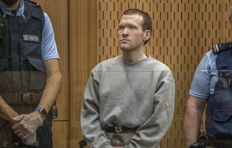 Twenty-nine-year-old Australian Brenton Harrison Tarrant stands in the dock at the Christchurch High Court for sentencing after pleading guilty to 51 counts of murder, 40 counts of attempted murder and one count of terrorism in Christchurch, New Zealand, Monday, Aug. 24, 2020. More than 60 survivors and family members will confront the New Zealand mosque gunman this week when he appears in court to be sentenced for his crimes in the worst atrocity in the nation's modern history. (John Kirk-Anderson/Pool Photo via AP)