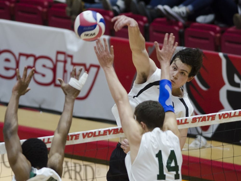 Senior outside attacker Brendan Surane hits the ball against George Mason University on Jan. 26 at Worthen Arena. Ball State won the match 3-1, improving their record to 7-1. Emma Rogers // DN