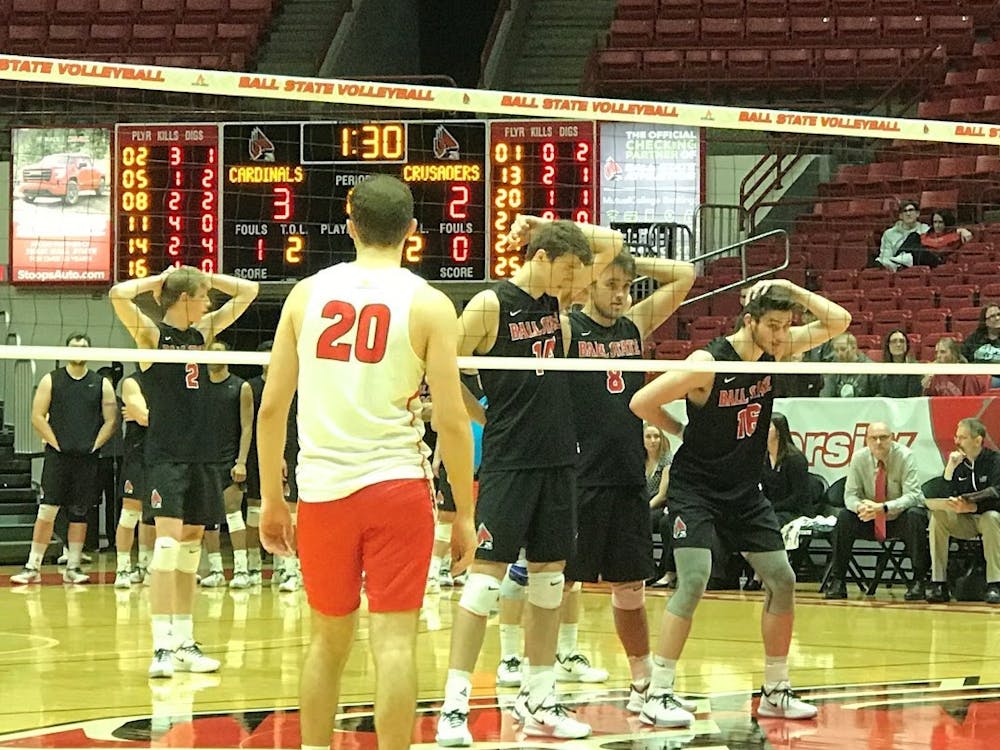 Ball State Men's Volleyball players prepare for a serve Jan. 10 in John E. Worthen Arena. The Cardinals swept Belmont Abbey in the first match of the Active Ankle Challenge. Connor Smith, DN