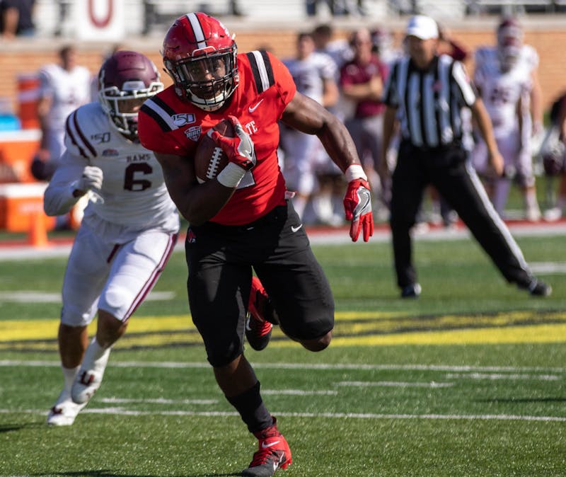 Junior running back Caleb Huntley runs the ball in for a touchdown Sept. 7, 2019, at Scheumann Stadium. Huntley had 13 carries against the Rams. Jacob Musselman, DN