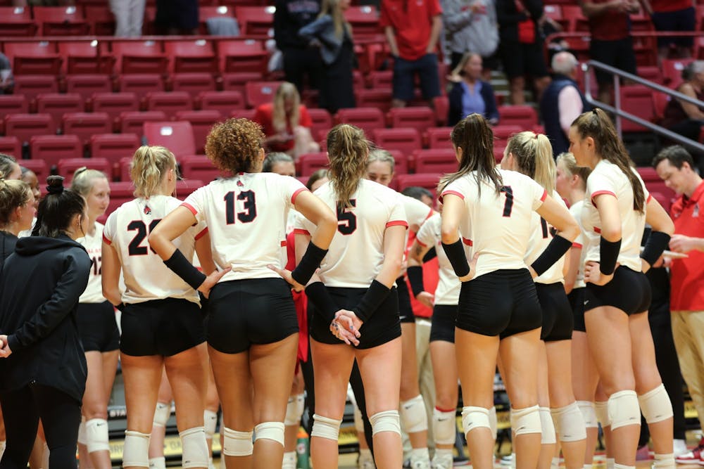 The Ball State Women's Volleyball team huddles up during a time out in a game against Arkansas State at Worthen Arena Sept. 9. Ball State beat Arkansas State 3-0. Caroline Stalvey, DN