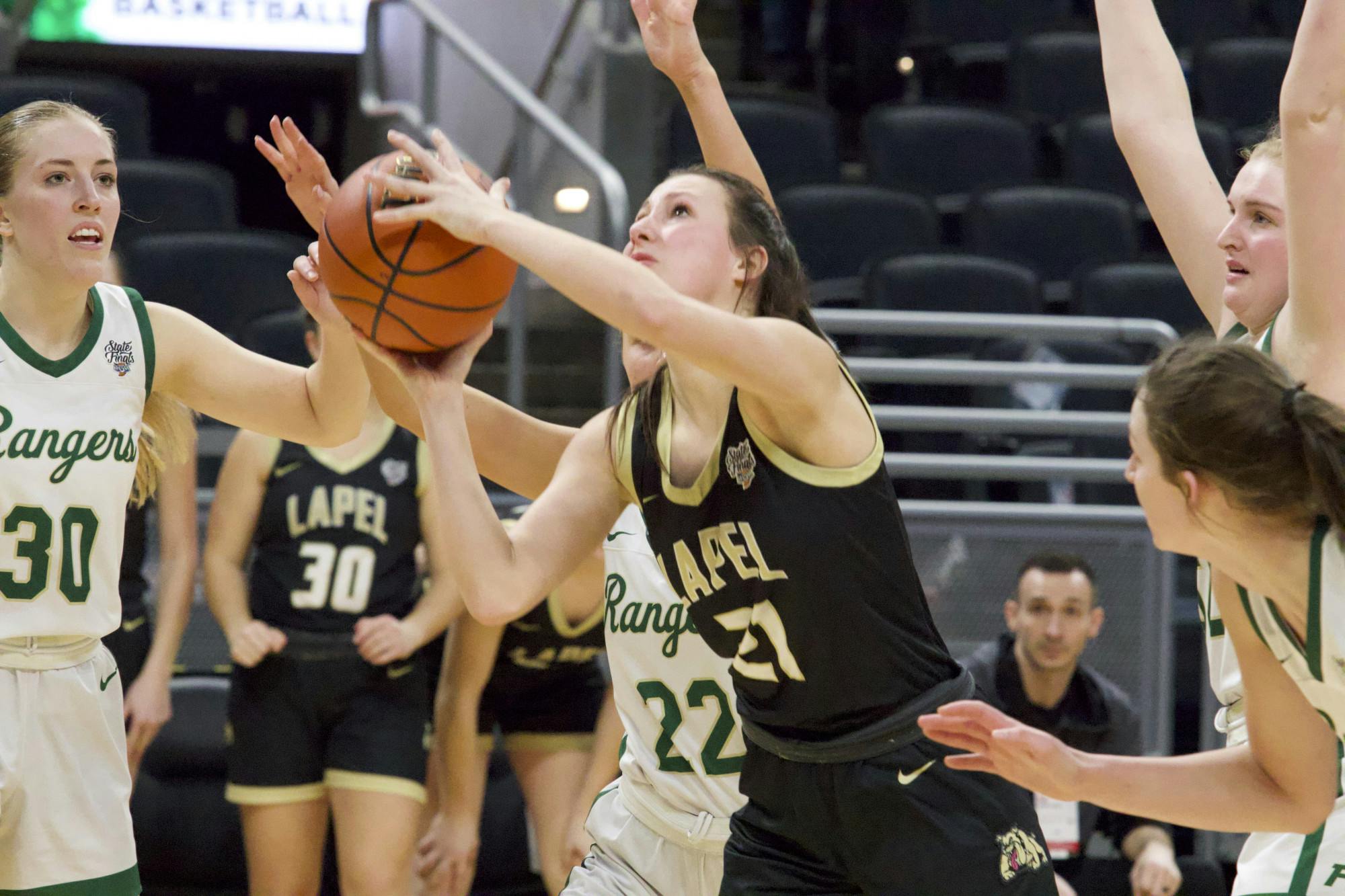 Lapel junior Madelyn Poynter goes for a layup Feb. 25 at Gainbridge Fieldhouse. Zach Carter, DN