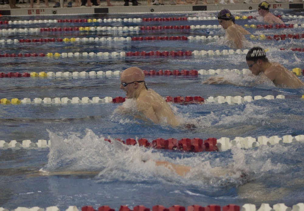 Junior Luke Nondorf (second from bottom) swims in the men’s 100 yard breaststroke at the Butler Invitational Jan. 27, 2019 at Fishers High School. Nondorf won this heat and finished ninth overall in the event. Patrick Murphy,DN  