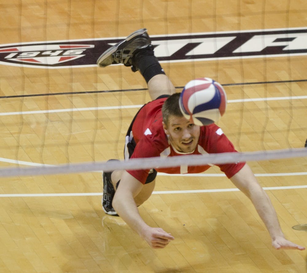 Junior libero David Ryan Vander Meer dives for the ball in the second set against McKendree Jan. 24 at Worthen Arena. Vander Meer had eight digs. DN PHOTO BREANNA DAUGHERTY