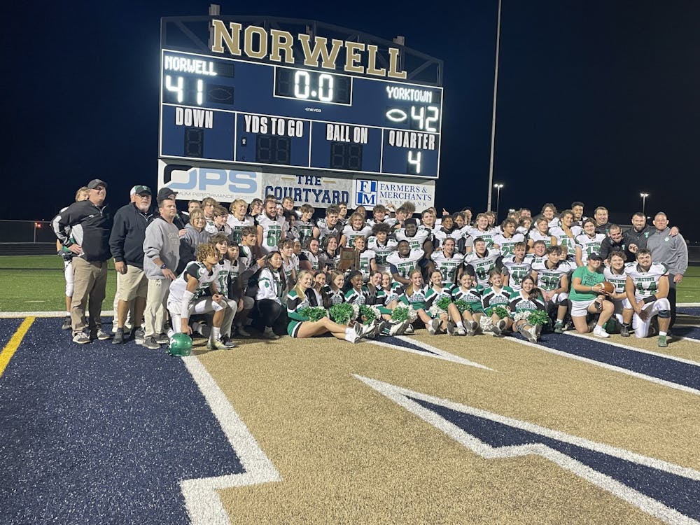 The Yorktown football team poses with the sectional championship after defeating Norwell 42-41 Nov. 4. Yorktown Athletics, photo provided