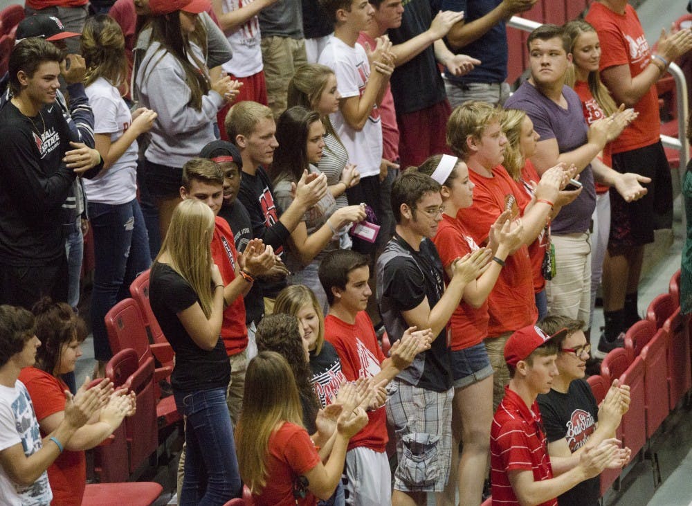 students cheer on the women's volleyball team in the second game of the Active Ankle Tournament against Belmont on Aug. 28 at Worthen Arena. DN PHOTO BREANNA DAUGHERTY