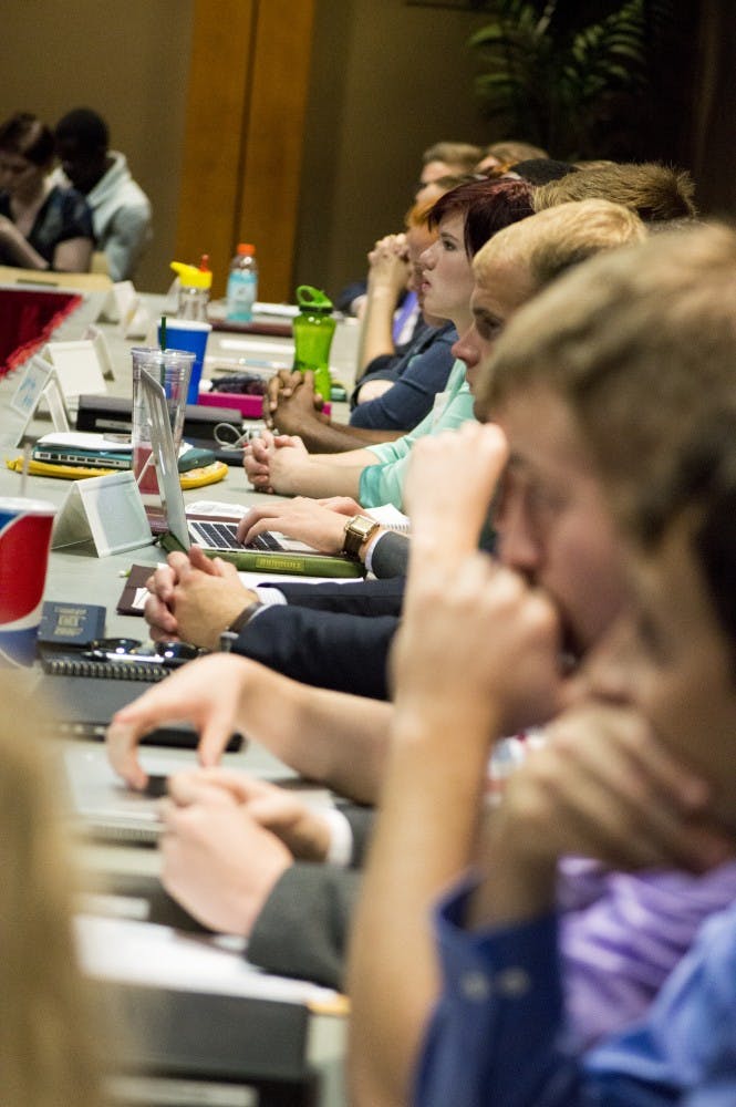 Candidates for president pro tempore for the Student Government Association listen to speeches from other candidates at the election on Wednesday. Aric Hopper, a junior political science major, was elected by the panel. DN PHOTO ALAINA JAYE HALSEY