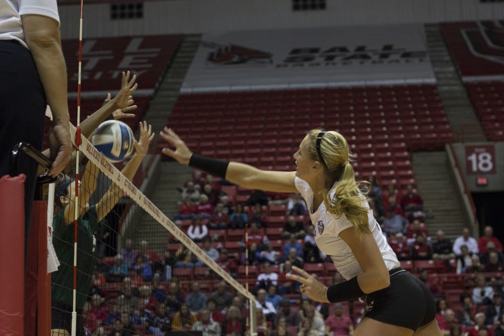 Jenna Spadafora, a sophomore setter, spikes the ball against Eastern Michigan on Nov. 2. Spadafora had 9 kills during the match. DN PHOTO EMMA ROGERS