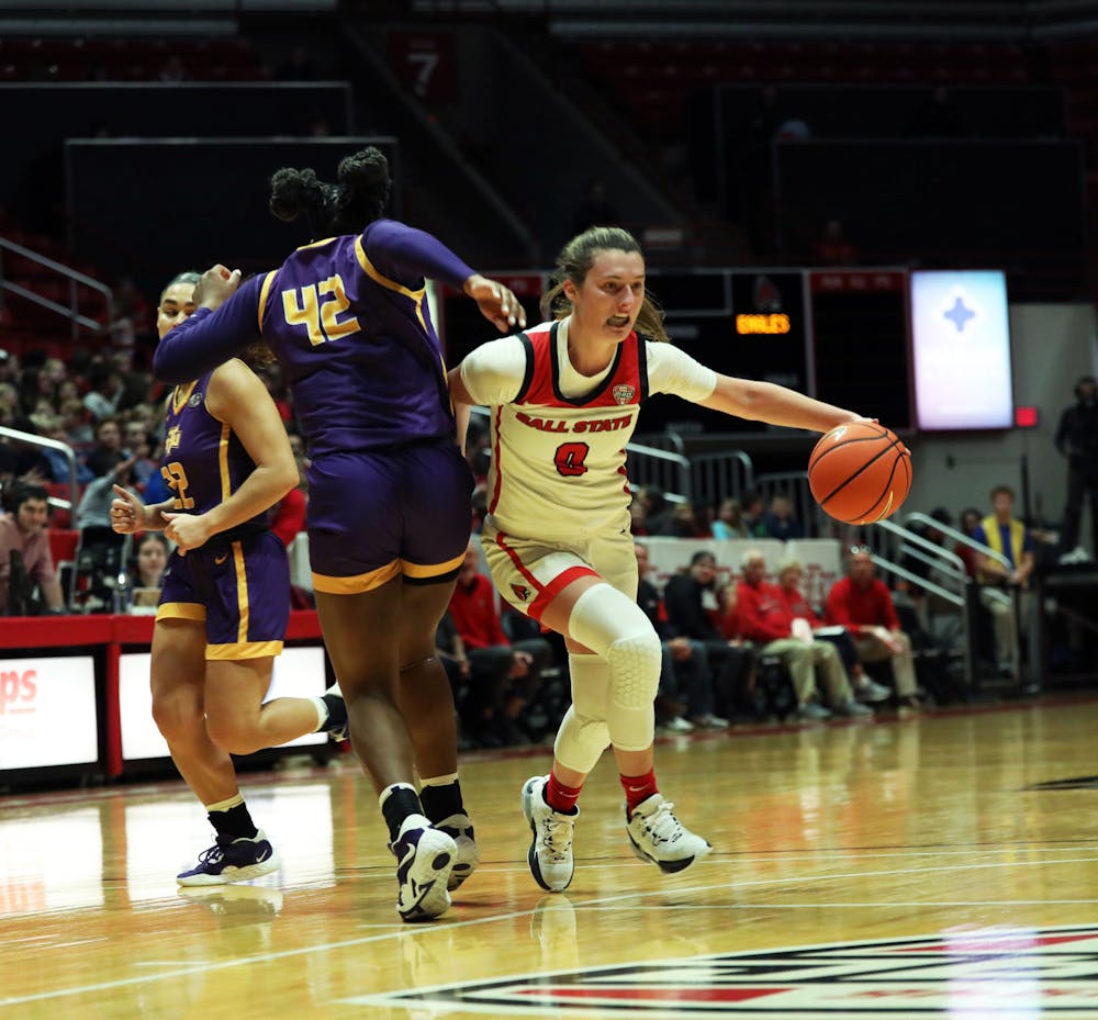 Junior Ally Becki dribbles the ball towards the net against Tennessee Tech Nov. 6 at Worthen Arena. Becki had seven assists in the game. Mya Cataline, DN