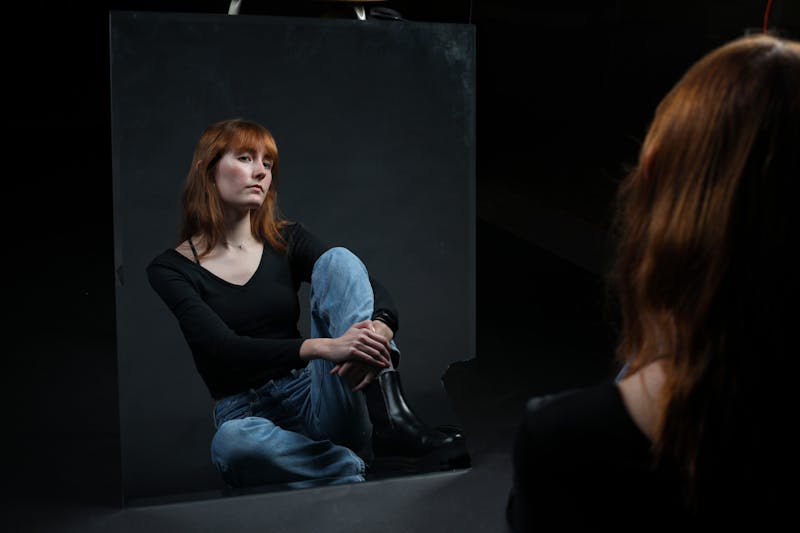 First-year journalism major Kate Farr poses in the photojournalism studio in the Art and Journalism Building on campus Jan. 24. Jacy Bradley, DN