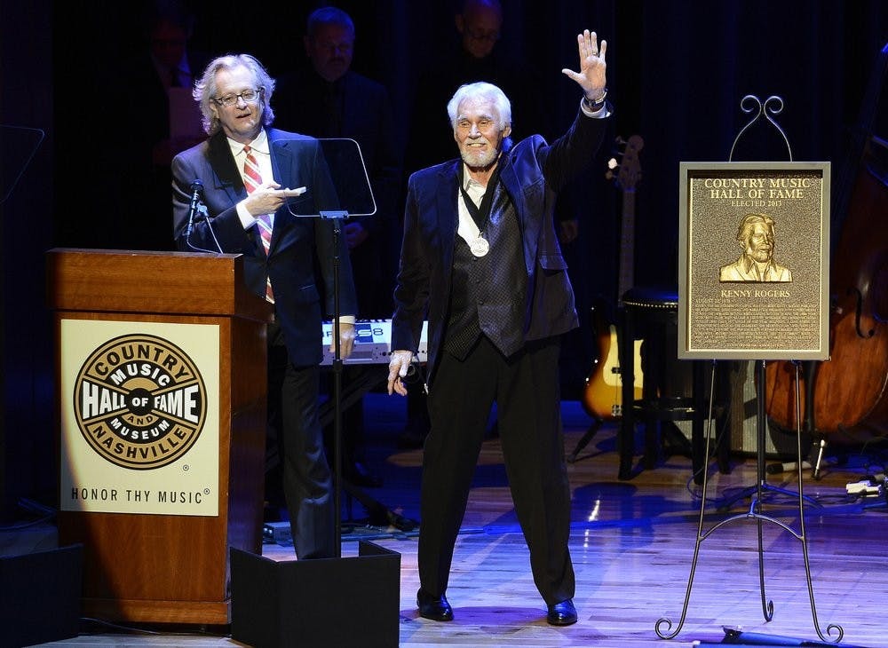 <p>In this Oct. 27, 2013, file photo, country music star Kenny Rogers thanks the audience at the ceremony for the 2013 inductions into the Country Music Hall of Fame in Nashville, Tenn. Actor-singer Kenny Rogers, the smooth, Grammy-winning balladeer who spanned jazz, folk, country and pop with such hits as “Lucille,” “Lady” and “Islands in the Stream” and embraced his persona as “The Gambler” on record and on TV died Friday night, March 20, 2020. He was 81. <strong>(AP Photo/Mark Zaleski, File)</strong></p>