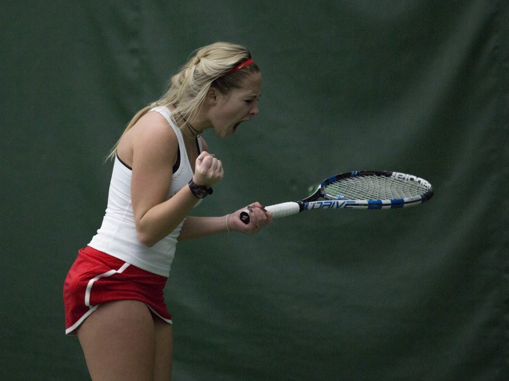  Sophomore Peyton Gollhofer reacts after winning a point during her singles match against Wright State on Feb. 5. Emma Rogers // DN