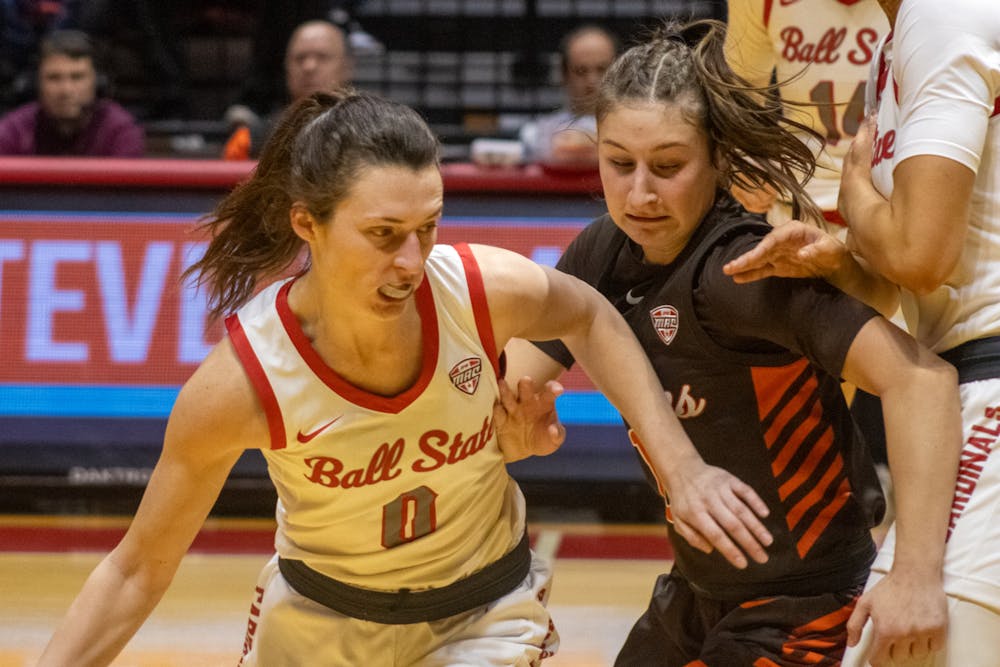 Senior Ally Becki drives the ball against Bowling Green Feb. 5th at Worthen Arena. Becki had 17 points in the game. Jayce Blane, DN