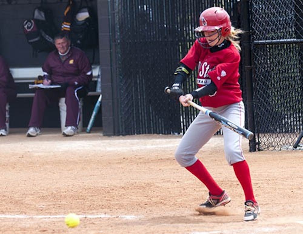 Taylor Cox bunts a ball in the game against Central Michigan on April 22, 2012. Cox was awarded Player of the Week in the Mid-American Conference West on Tuesday. DN FILE PHOTO JONATHAN MIKSANEK