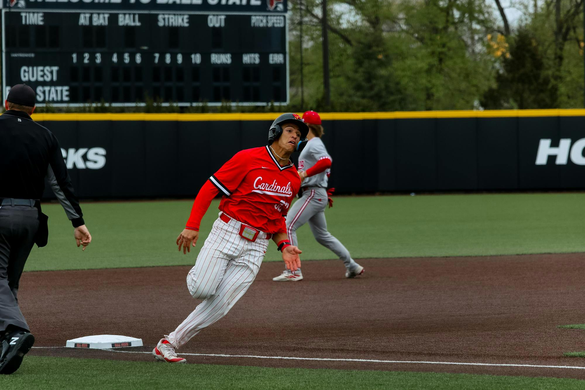 Junior catcher Hunter Dobbins rounds the baseline home against Indiana University April 24 at First Merchants Ballpark. Dobbins hit and caught during the game against IU. Isabella Kemper, DN