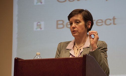 Suicide Survivor, Heidi Bryan describes what it's like to live inside the brain of someone battling depression and contemplating suicide on a daily basis. She described it as "a choir of critics constantly singing in my head" and that what has helped her are the little things such as recieving phone calls from her counselors, lollypops from friends and minor beauties in nature. Heidi spent the final minutes of her presentation discussing what people can do to help each other after a loss of someone to suicide as well as how to prevent it.DN PHOTO RJ RICKER