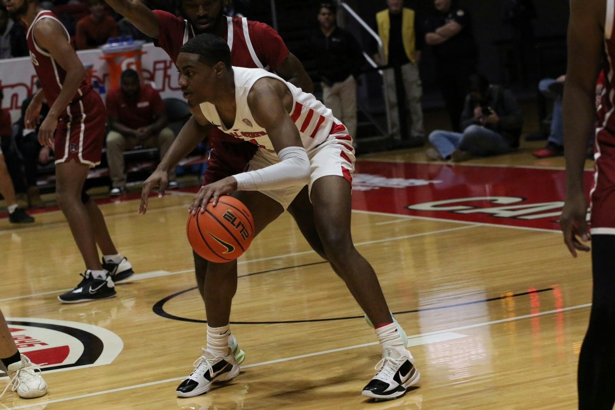 Senior guard Demarius Jacobs looks to pass the ball in a game against IU-South Bend Nov. 19 at Worthen Arena. Jacobs scored 12 points during the game. Mya Cataline, DN