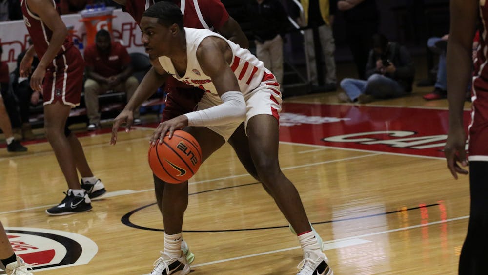 Senior guard Demarius Jacobs looks to pass the ball in a game against IU-South Bend Nov. 19 at Worthen Arena. Jacobs scored 12 points during the game. Mya Cataline, DN