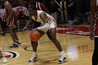 Senior guard Demarius Jacobs looks to pass the ball in a game against IU-South Bend Nov. 19 at Worthen Arena. Jacobs scored 12 points during the game. Mya Cataline, DN