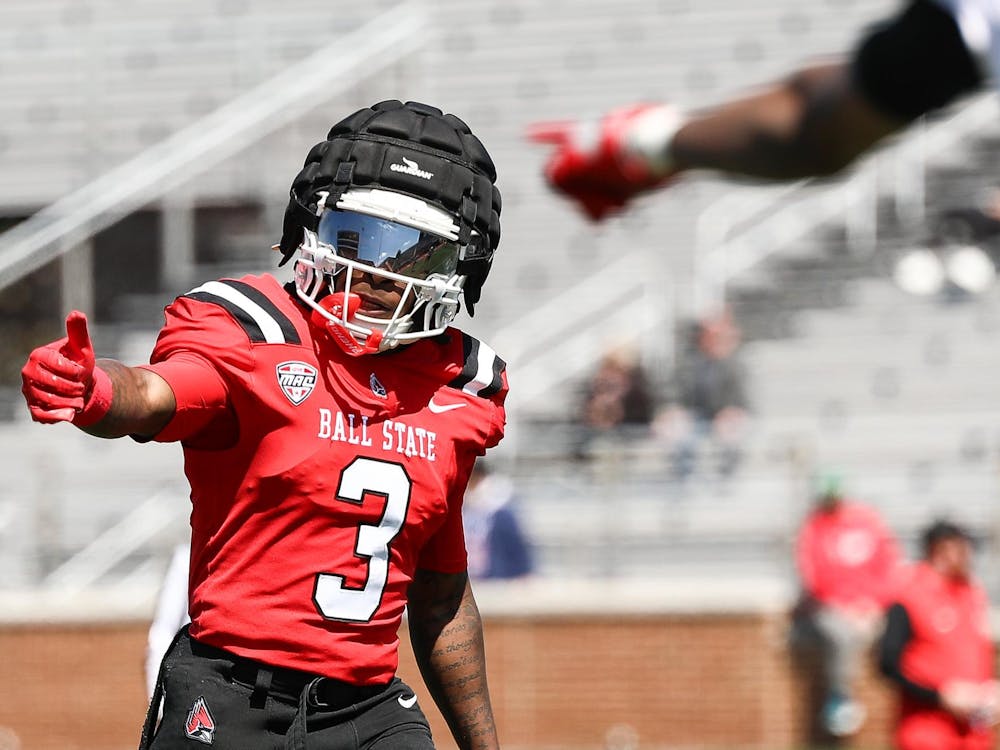 Junior wide receiver Eric Weatherly gives a thumbs up to refs during Ball States spring scrimmage April 12 at Scheumann Stadium. Andrew Berger, DN
