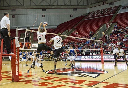 Greg Herceg and Matt Leske block an early attack by IPFW during the MIVA quarter final match on April 20, 2013. The team won the match 3-0 and will proceed to the semi-final match. DN PHOTO COREY OHLENKAMP