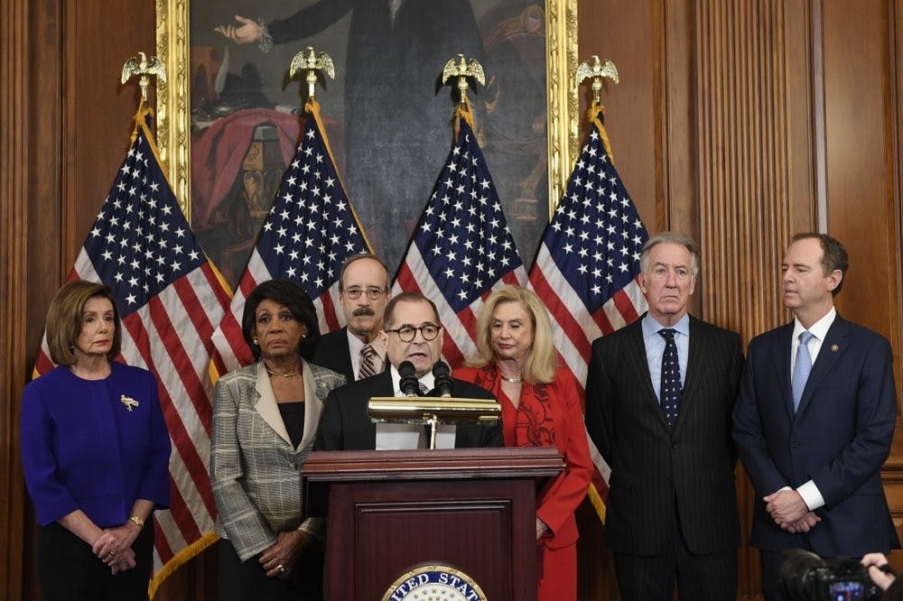 <p>From left House Speaker Nancy Pelosi, Chairwoman of the House Financial Services Committee Maxine Waters, D-Calif., Chairman of the House Foreign Affairs Committee Eliot Engel, D-N.Y., House Judiciary Committee Chairman Jerrold Nadler, D-N.Y., Chairwoman of the House Committee on Oversight and Reform Carolyn Maloney, D-N.Y., House Ways and Means Chairman Richard Neal and Chairman of the House Permanent Select Committee on Intelligence Adam Schiff, D-Calif., unveil articles of impeachment against President Donald Trump, during a news conference on Capitol Hill in Washington, Tuesday, Dec. 10, 2019. <strong>(AP Photo/Susan Walsh)</strong></p>