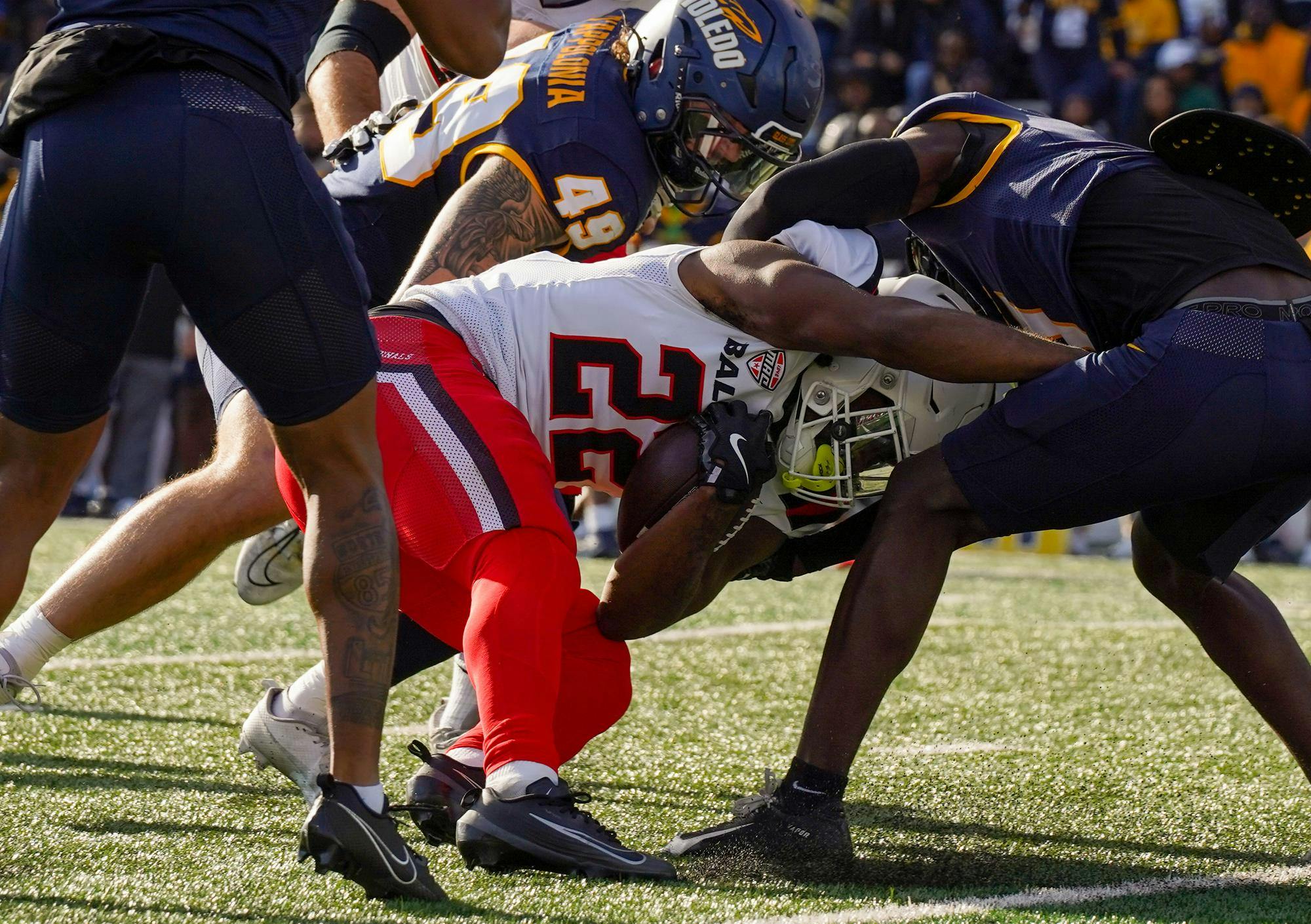 Freshman running back Jalen Bonds runs with the ball against Toledo Nov. 22 at Glass Bopwl Stadium. Isabella Kemper, DN