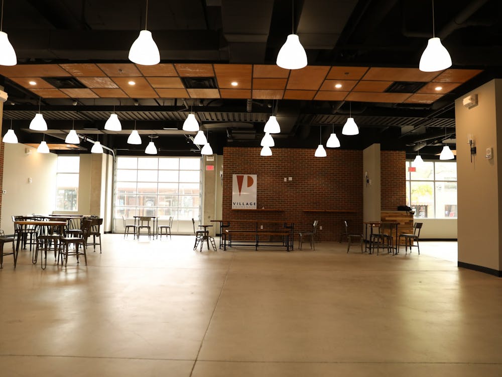 Hanging lights illuminate the location of the Fashion Merchandising Association&#x27;s resale pop-up shop. Members plan to decorate the room with clothing racks, tables and a photo booth for customers. Rylan Capper, DN