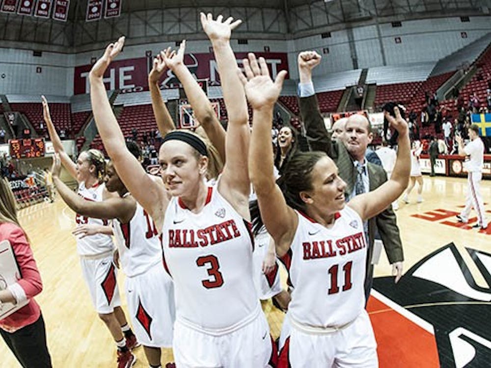 The Ball State's Women's Basketball team wave to the crowd after their 53-48 victory over Northern Iowa. The team will progress to the WNIT's "Sweet 16." DN PHOTO JONATHAN MIKSANEK
