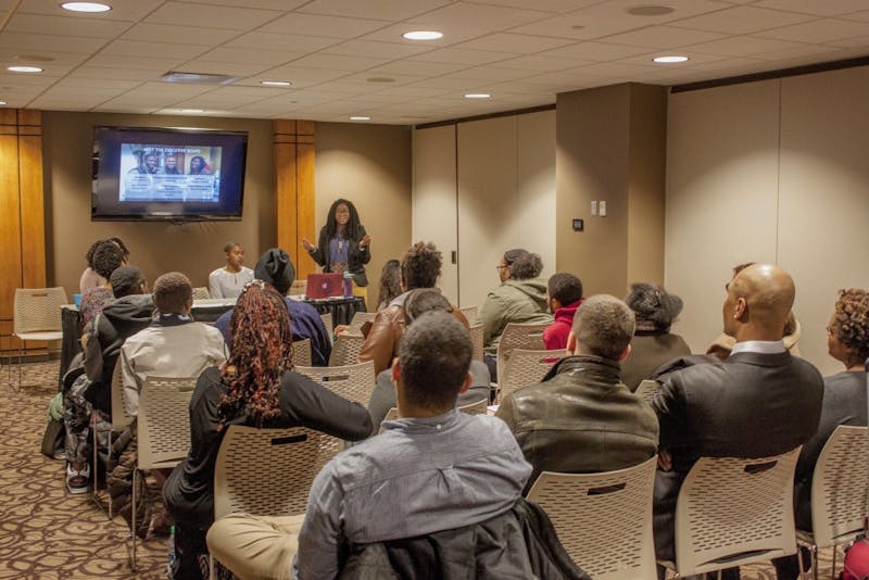 (left to right) Professional Development chair Alexis Fort, Vice President Alexicia Kilgore, and President Ciara Johnson speak to students on Feb. 7 in the L.A. Pittenger&nbsp;Student Center. &nbsp;Demi Vaughn // DN Photo