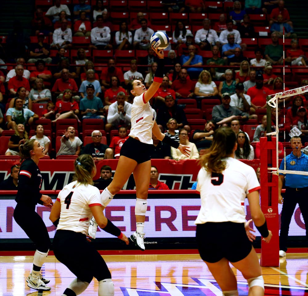 <p>Sophomore opposite hitter Katie Egenolf tips the ball against The University of Oklahoma Aug. 26 at Worthen Arena. Egenolf scored five points during the game. Mya Cataline, DN</p>
