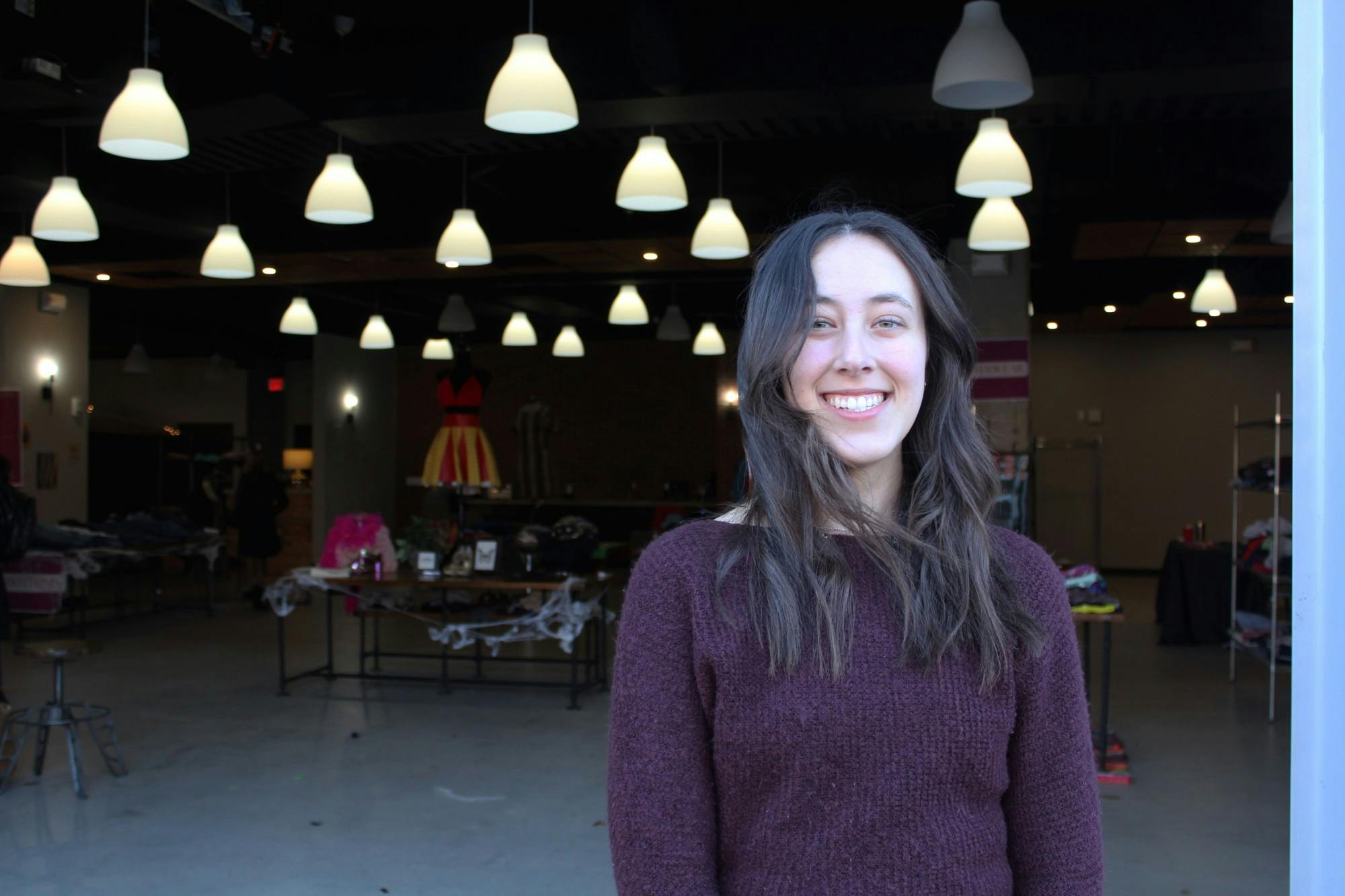 Maureen Kirk, third-year fashion merchandising major and FMA president, poses for a portrait Oct. 28 outside FMA’s pop-up shop. Kirk has big plans for the organization’s future and is hoping they can do more events like the shop. Maya Wilkins, DN