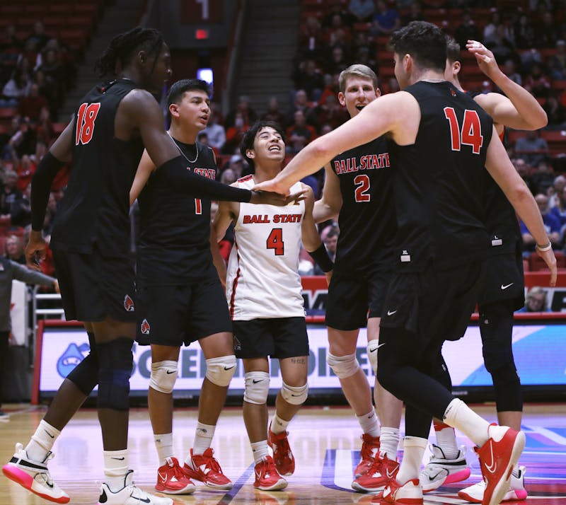 The Ball State Men's Volleyball team celebrates a point being scored for Ball State in a game against BYU Feb. 4 at Worthen Arena. Ball State defeated BYU 3-1. Amber Pietz, DN