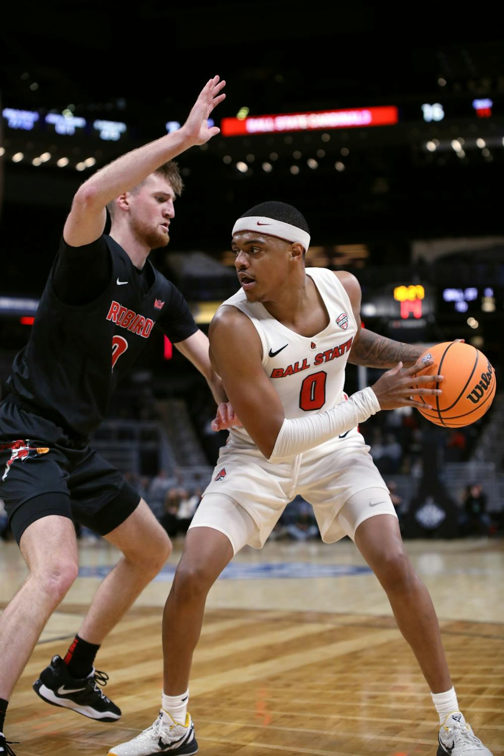 Redshirt junior guard Jarron Coleman looks to pass the ball in a game against Illinois State at the Indy Classic Dec. 17 at Gainbridge Fieldhouse in Indianapolis. Coleman had seven assists during the game. Amber Pietz, DN