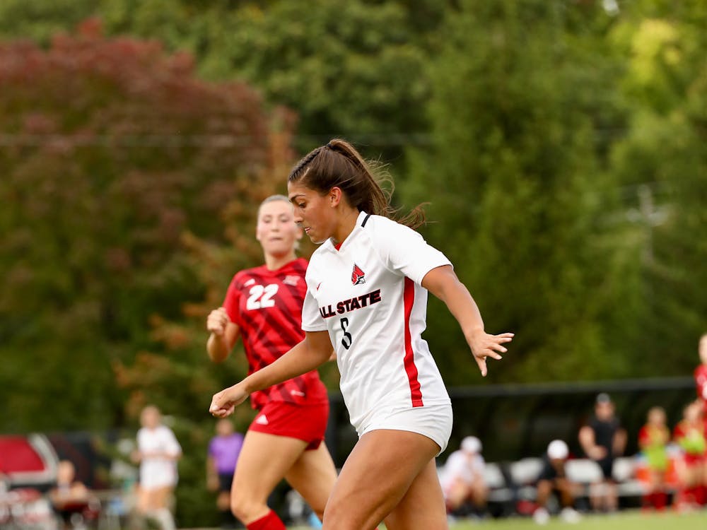 Sophmore forward Delaney Caldwell rears back for a pass upfield against Miami Sept. 21 at Briners Sports Complex. Caldwell was responsible for one of the Cardinals goals against the Redhawks. Andrew Berger, DN