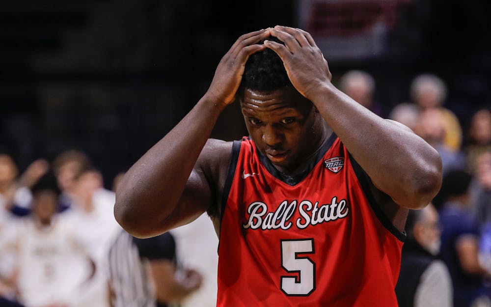 Ball State senior center Payton Sparks puts his hands on his head while playing Toledo Feb. 18 at John F. Savage Arena. Ball State lost 67-66 against Toledo. Andrew Berger, DN 