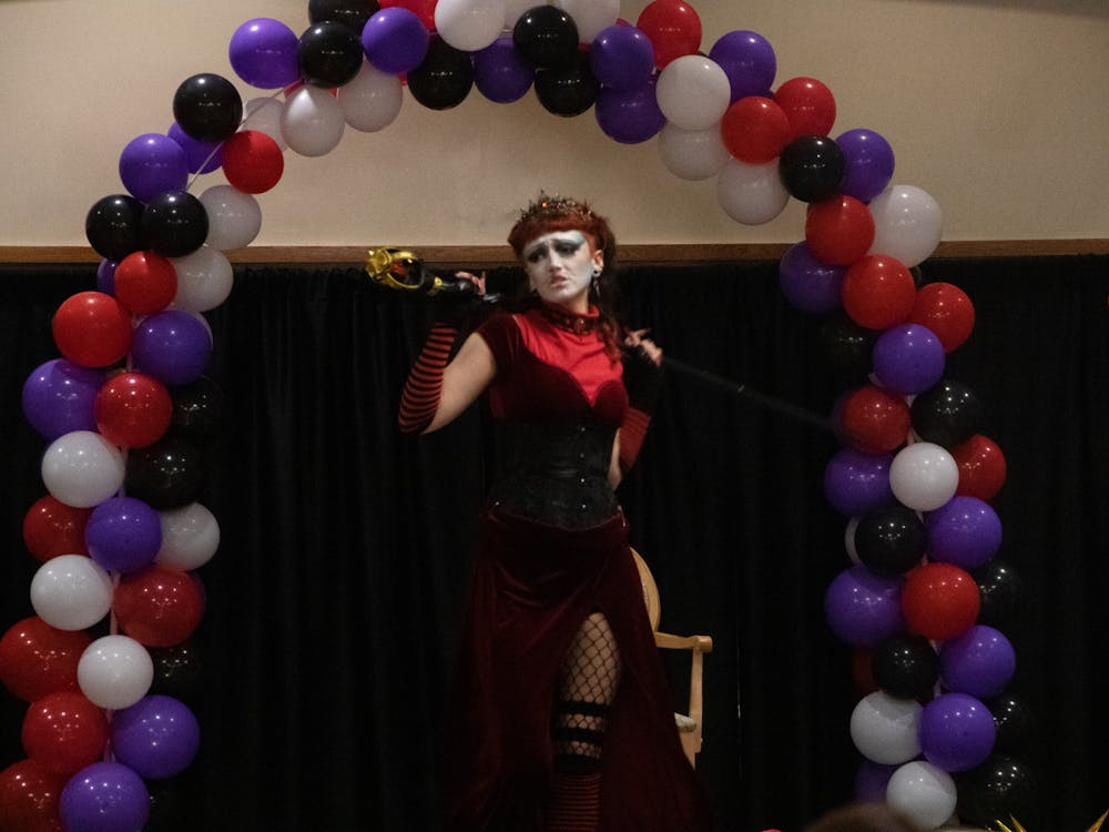 King Kunt, visual communications major, performs at Spectrum's "Mad Hatter's Drag Party" March 31 in the L.A. Pittenger Student Center. Madelyn Bracken, DN